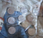 9 monedas de plata con su plastico,diferentes aos originales