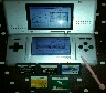 una nintendo ds con 5 juegos