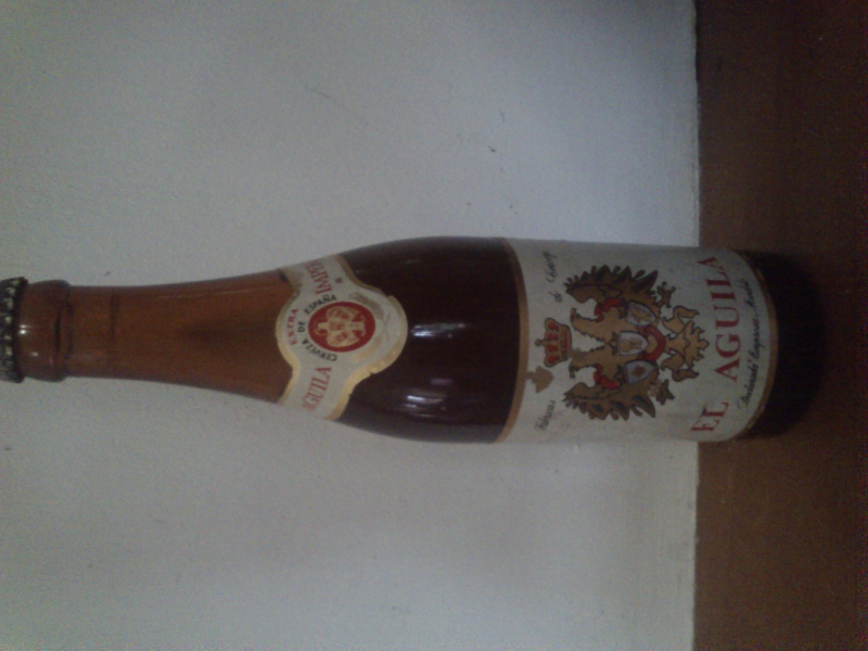 botella de el Aguila Imperial Extra cerrada