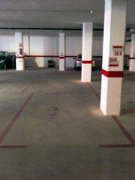 Plazas de garaje por coche