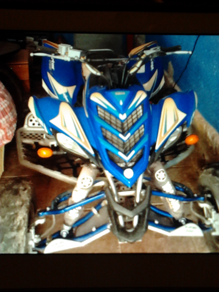 cambio quad por mtoto de agua o coche 