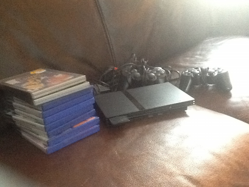 Playstation 2 mas juegos y dos mandos